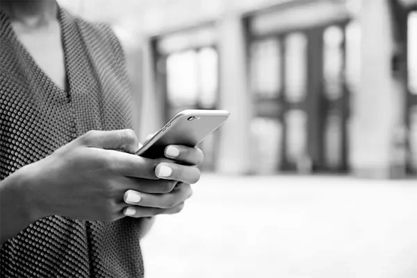 a mobile phone in a person's hands